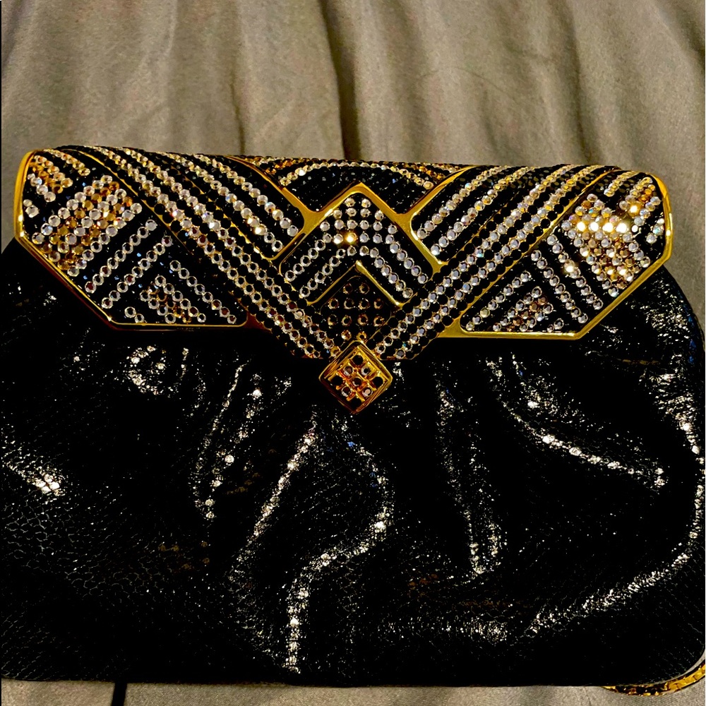 Snake/rhinestone clutch handbag with gold strap. Mirror and comb included.